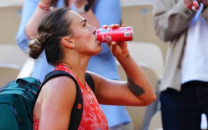 Aryna Sabalenka leaves court after her quarter final defeat to Mirra Andreeva and downs a can of Coca Cola French Open Tennis, Day 11, Tennis, Roland Garros, Paris, France - 05 June 2024  Copyright: xJavierxGarcia Shutterstockx 14521935al