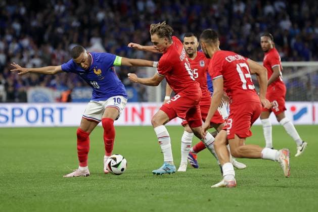 Kylian MbappÃ France 10 in duel with Mathias Olesen Luxembourg 19 , Mirza Mustafic Luxembourg 15 , Dirk Carlson Luxembourg 13 Football, Season 20223 2024, Friendly match, International match 05 06 2024 National team France Luxembourg France vs Luxembourg Stade Saint Symphorien, Metz