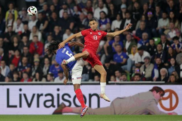 Head-to-head duel between Jules KoundÃ France 5 and Dirk Carlson Luxembourg 13 Football, Season 20223 2024, Friendly match, International match 05 06 2024 National team France Luxembourg France vs Luxembourg Stade Saint Symphorien, Metz