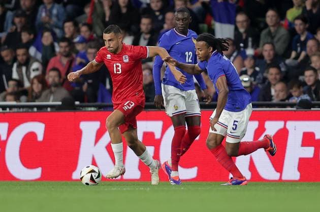 Dirk Carlson Luxembourg 13 in duel with Jules KoundÃ France 5 Football, Season 20223 2024, Friendly match, International match 05 06 2024 National team France Luxembourg France vs Luxembourg Stade Saint Symphorien, Metz