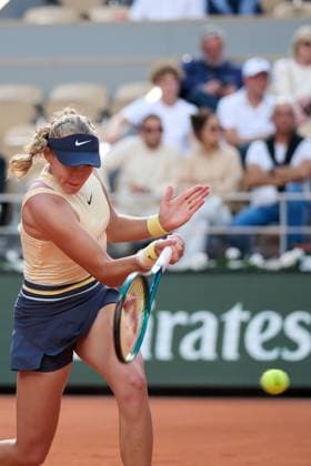 (240606) -- PARIS, June 6, 2024 -- Mirra Andreeva hits a return during the women s singles quarterfinal match between Mirra Andreeva of Russia and Aryna Sabalenka of Belarus at the French Open tennis tournament at Roland Garros, Paris, France, June 5, 2024. ) (SP)FRANCE-PARIS-TENNIS-FRENCH OPEN-WOMEN S SINGLES MengxDingbo 