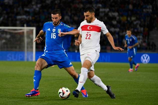 4th June 2024; Stadio Renato Dall Ara, Bologna, Italy; International Football Friendly, Italy versus Turkey; (L-R) Bryan Cristante of Italy holds off Kaan Ayhan of Turkey  ActionPlus12651151 BestxImages
