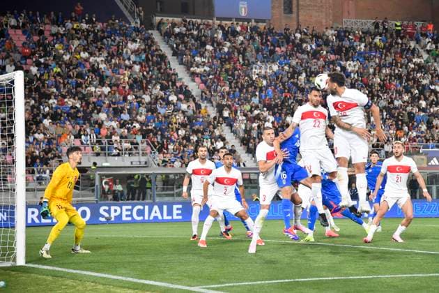 4th June 2024; Stadio Renato Dall Ara, Bologna, Italy; International Football Friendly, Italy versus Turkey; Hakan Calhanoglu and Ayhan of Turkey clear the cross with a header  ActionPlus12651126 BestxImages