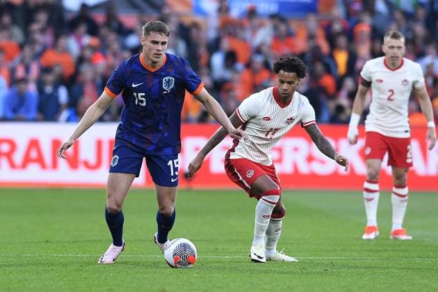 International soccer match Netherlands Canada on 06 06 2024 at Feyenoord Stadium in Rotterdam Micky van de Ven Netherlands , left Tajon Buchanan Canada , right xRx