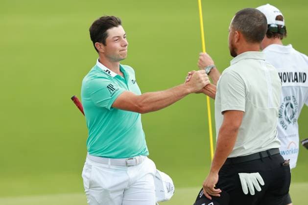 The Memorial Tournament Viktor Hovland of Norway (L) shakes hands with Xander Schauffele of the United States after completing the 18th hole during Day One of The Memorial Tournament presented by Workday at Muirfield Village Golf Club in Dublin, Ohio, USA on Thursday, June 6, 2024. Dublin Ohio United States  Copyright: xJorgexLemusx originalFilename:lemus-thememor240606_npWBx.jpg