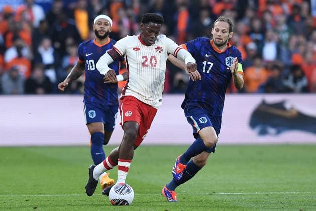 International soccer match Netherlands Canada on 06 06 2024 at Feyenoord Stadium in Rotterdam Jonathan David Canada , left Daley Blind Netherlands , right xRx