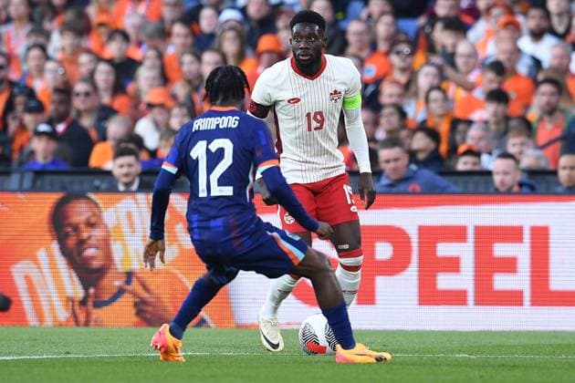 International soccer match Netherlands Canada on 06 06 2024 at Feyenoord Stadium in Rotterdam Alphonso Davies Canada , back Jeremie Frimpong Netherlands , front xRx
