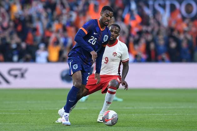 International soccer match Netherlands Canada on 06 06 2024 at Feyenoord Stadium in Rotterdam Teun Koopmeiners Netherlands , front Cyle Larin Canada , back xRx