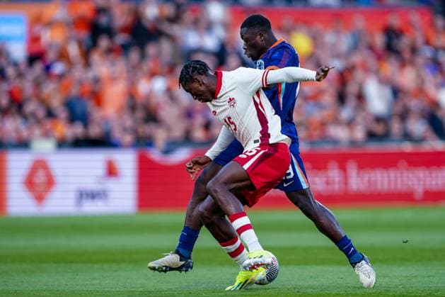 2024-06-06 Netherlands v Canada - Friendly International ROTTERDAM, NETHERLANDS - JUNE 6: Moise Bombito of Canada battles for the ball with Brian Brobbey of Netherlands during the Friendly international match, Länderspiel, Nationalmannschaft between Netherlands and Canada at Stadion Feijenoord de Kuip on June 6, 2024 in Rotterdam, Netherlands. (Photo by Andre Weening BSR Agency) Rotterdam Netherlands Content not available for redistribution in The Netherlands directly or indirectly through any third parties. Copyright: xBSRxAgencyx