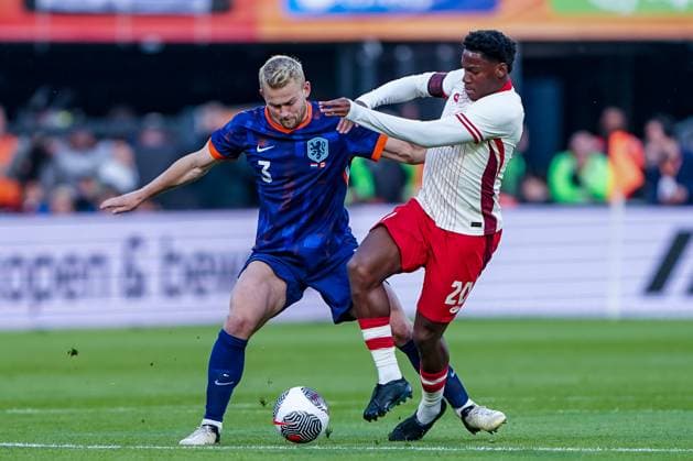 2024-06-06 Netherlands v Canada - Friendly International ROTTERDAM, NETHERLANDS - JUNE 6: Matthijs De Ligt of Netherlands battles for the ball with Jonathan David of Canada during the Friendly international match, Länderspiel, Nationalmannschaft between Netherlands and Canada at Stadion Feijenoord de Kuip on June 6, 2024 in Rotterdam, Netherlands. (Photo by Andre Weening BSR Agency) Rotterdam Netherlands Content not available for redistribution in The Netherlands directly or indirectly through any third parties. Copyright: xBSRxAgencyx