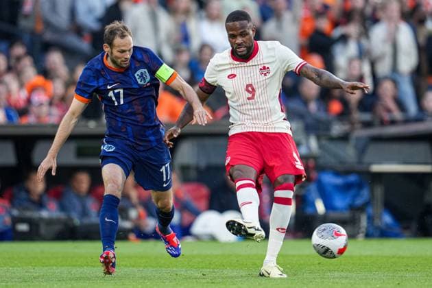 2024-06-06 Netherlands v Canada - Friendly International ROTTERDAM, NETHERLANDS - JUNE 6: Daley Blind of Netherlands, Cyle Larin of Canada battle for the ball during the Friendly international match, Länderspiel, Nationalmannschaft between Netherlands and Canada at Stadion Feijenoord de Kuip on June 6, 2024 in Rotterdam, Netherlands. (Photo by Patrick Goosen BSR Agency) Rotterdam Netherlands Content not available for redistribution in The Netherlands directly or indirectly through any third parties. Copyright: xBSRxAgencyx
