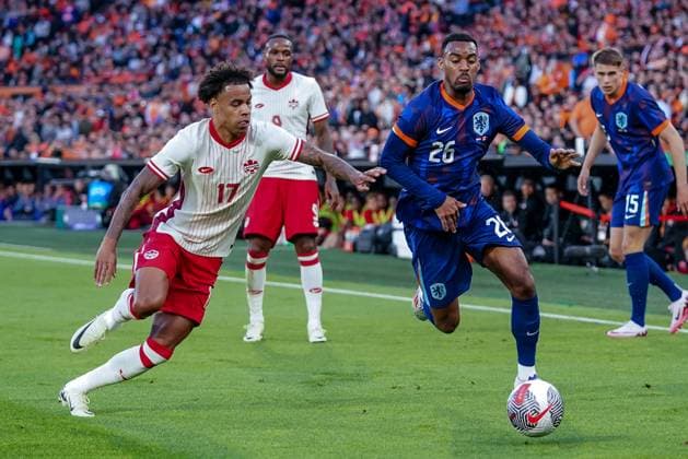 2024-06-06 Netherlands v Canada - Friendly International ROTTERDAM, NETHERLANDS - JUNE 6: Ryan Gravenberch of Netherlands battles for the ball with Tajon Buchanan of Canada during the Friendly international match, Länderspiel, Nationalmannschaft between Netherlands and Canada at Stadion Feijenoord de Kuip on June 6, 2024 in Rotterdam, Netherlands. (Photo by Andre Weening BSR Agency) Rotterdam Netherlands Content not available for redistribution in The Netherlands directly or indirectly through any third parties. Copyright: xBSRxAgencyx