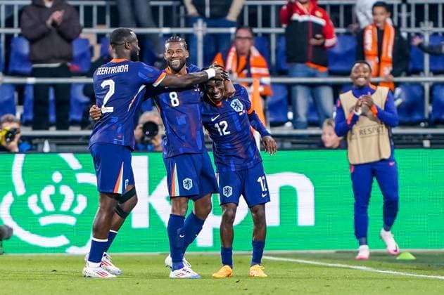 2024-06-06 Netherlands v Canada - Friendly International ROTTERDAM, NETHERLANDS - JUNE 6: Jeremie Frimpong of Netherlands celebrates after scoring his sides second goal with Georginio Wijnaldum of Netherlands. and Lutsharel Geertruida of Netherlands during the Friendly international match, Länderspiel, Nationalmannschaft between Netherlands and Canada at Stadion Feijenoord de Kuip on June 6, 2024 in Rotterdam, Netherlands. (Photo by Andre Weening BSR Agency) Rotterdam Netherlands Content not available for redistribution in The Netherlands directly or indirectly through any third parties. Copyright: xBSRxAgencyx