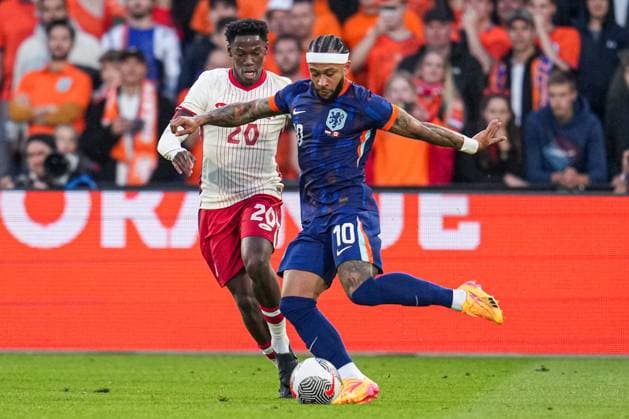 2024-06-06 Netherlands v Canada - Friendly International ROTTERDAM, NETHERLANDS - JUNE 6: Jonathan David of Canada, Memphis Depay of Netherlands battle for the ball during the Friendly international match, Länderspiel, Nationalmannschaft between Netherlands and Canada at Stadion Feijenoord de Kuip on June 6, 2024 in Rotterdam, Netherlands. (Photo by Patrick Goosen BSR Agency) Rotterdam Netherlands Content not available for redistribution in The Netherlands directly or indirectly through any third parties. Copyright: xBSRxAgencyx
