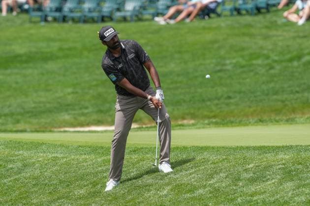 DUBLIN, OH - JUNE 06: Sahith Theegala plays his shot from the rough on the 14th hole during the first round of the Memorial Tournament presented by Workday on June 6, 2024 at Muirfield Village Golf Club in Dublin, Ohio. (Photo by Jason Mowry Icon Sportswire) GOLF: JUN 06 PGA, Golf Herren the Memorial Tournament presented by Workday EDITORIAL USE ONLY Icon240606073