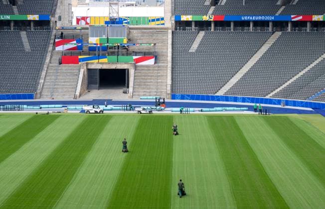 Football, men, 2023 2024 season, ahead of the 2024 European Championship in Germany, Stadium Open Media Day at the Berlin Olympic Stadium, Greenkeeper tending to the pitch, 07 06 2024, Copyright: xMatthiasxKochx