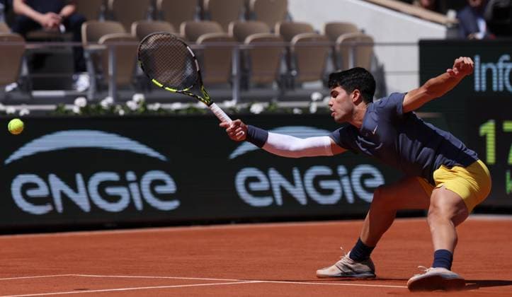(240607) -- PARIS, June 7, 2024 -- Carlos Alcaraz hits a return during the men s singles semifinal between Carlos Alcaraz of Spain and Jannik Sinner of Italy at the French tennis tournament at Roland Garros in Paris, France, on June 7, 2024. ) (SP)FRANCE-PARIS-TENNIS-FRENCH OPEN-MEN S SINGLES GaoxJing 