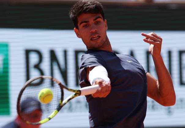 (240607) -- PARIS, June 7, 2024 -- Carlos Alcaraz hits a return during the men s singles semifinal between Carlos Alcaraz of Spain and Jannik Sinner of Italy at the French tennis tournament at Roland Garros in Paris, France, June 7, 2024. ) (SP)FRANCE-PARIS-TENNIS-FRENCH OPEN-MEN S SINGLES GaoxJing 