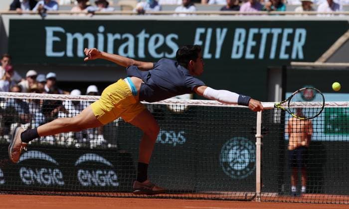(240607) -- PARIS, June 7, 2024 -- Carlos Alcaraz hits a return during the men s singles semifinal between Carlos Alcaraz of Spain and Jannik Sinner of Italy at the French tennis tournament at Roland Garros in Paris, France, June 7, 2024. ) (SP)FRANCE-PARIS-TENNIS-FRENCH OPEN-MEN S SINGLES GaoxJing 