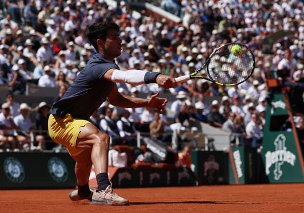 (240607) -- PARIS, June 7, 2024 -- Carlos Alcaraz hits a return during the men s singles semifinal between Carlos Alcaraz of Spain and Jannik Sinner of Italy at the French tennis tournament at Roland Garros in Paris, France, June 7, 2024. ) (SP)FRANCE-PARIS-TENNIS-FRENCH OPEN-MEN S SINGLES GaoxJing 