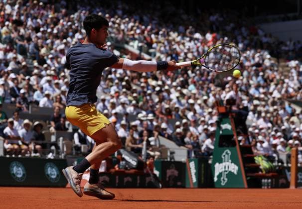 (240607) -- PARIS, June 7, 2024 -- Carlos Alcaraz hits a return during the men s singles semifinal between Carlos Alcaraz of Spain and Jannik Sinner of Italy at the French tennis tournament at Roland Garros in Paris, France, June 7, 2024. ) (SP)FRANCE-PARIS-TENNIS-FRENCH OPEN-MEN S SINGLES GaoxJing 