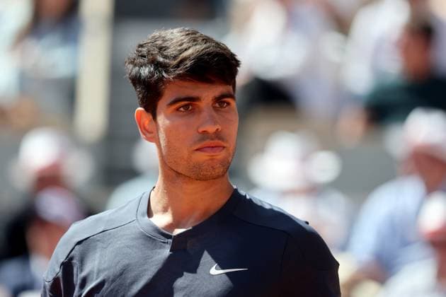 Carlos Alcaraz of Spain plays against Jannik Sinner of Italy during their semi-final match at the French Tennis Open in Roland Garros in Paris, France, on Friday, June 7, 2024. Alcaraz won 2-6, 6-3, 3-6, 6-4, 6-3 and qualified for the final.  PAR20240607110 MAYAxVIDON-WHITE