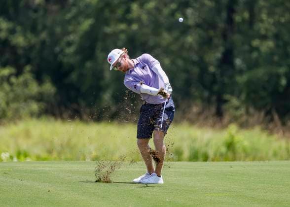 HUMBLE, TX - JUNE 07: Kieran Vincent (ZIM) hits his approach shot on 10 during the first round of the LIV Golf Houston tournament on June 7, 2024 at Golf Club of Houston in Humble, Texas (Photo by Leslie Plaza Johnson Icon Sportswire) GOLF: JUN 07 LIV Golf League Houston EDITORIAL USE ONLY Icon2406070121