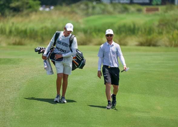 HUMBLE, TX - JUNE 07: Scott Vincent (ZIM) walks with caddie to the approach shot on 10 during the first round of the LIV Golf Houston tournament on June 7, 2024 at Golf Club of Houston in Humble, Texas (Photo by Leslie Plaza Johnson Icon Sportswire) GOLF: JUN 07 LIV Golf League Houston EDITORIAL USE ONLY Icon2406070241