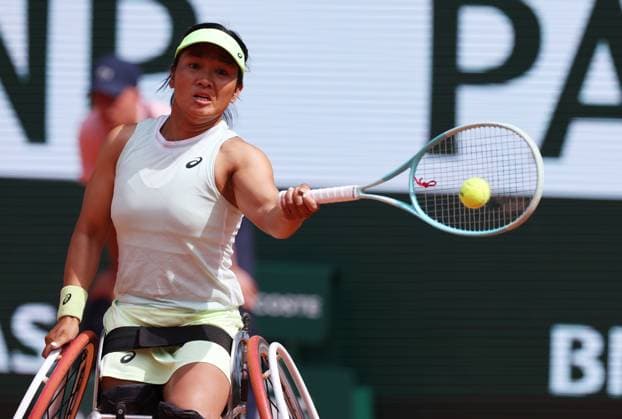 (240608) -- PARIS, June 8, 2024 -- Zhu Zhenzhen competes during the Women s Wheelchair Singles Final between Zhu Zhenzhen of China and Diede De Groot of the Netherlands at the French Open tennis tournament at Roland Garros in Paris, France, June 8, 2024. ) (SP)FRANCE-PARIS-TENNIS-FRENCH OPEN-WOMEN S WHEELCHAIR SINGLES GaoxJing 