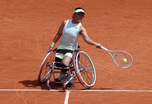 (240608) -- PARIS, June 8, 2024 -- Zhu Zhenzhen competes during the Women s Wheelchair Singles Final between Zhu Zhenzhen of China and Diede De Groot of the Netherlands at the French Open tennis tournament at Roland Garros in Paris, France, June 8, 2024. ) (SP)FRANCE-PARIS-TENNIS-FRENCH OPEN-WOMEN S WHEELCHAIR SINGLES GaoxJing 