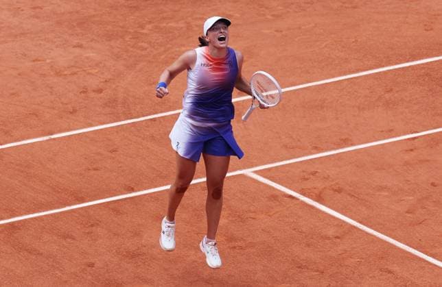 (240608) -- PARIS, June 8, 2024 -- Iga Swiatek celebrates after winning the women s singles final match between Iga Swiatek of Poland and Jasmine Paolini of Italy at the French Open tennis tournament at Roland Garros, Paris, France, June 8, 2024. ) (SP)FRANCE-PARIS-TENNIS-FRENCH OPEN-WOMEN S SINGLES GaoxJing 