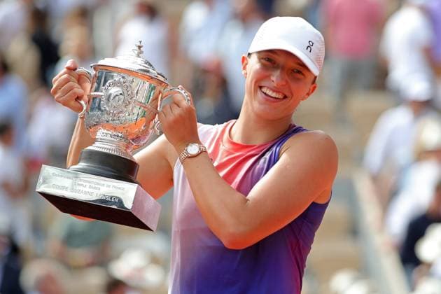 8th June 2024; Roland Garros, Paris, France; 2024 French Open Tennis tournament, Day 14; Iga Swiatek (POL) holds the Coupe Suzanne Lenglen after beating Jasmine Paolini (ITA) in the womens singles final  ActionPlus12652221 JonxBromley