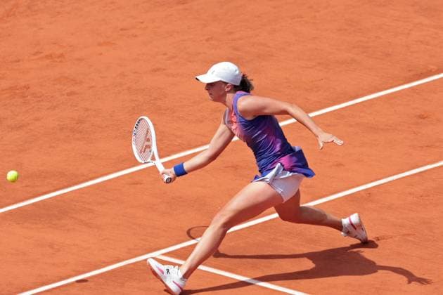 8th June 2024; Roland Garros, Paris, France; 2024 French Open Tennis tournament, Day 14; Iga Swiatek (POL) on the forehand during the womens singles final match against Jasmine Paolini (ITA)  ActionPlus12652269 JonxBromley