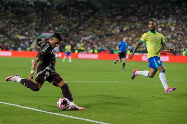 June 8, 2024, College Station, Texas, USA: MexicoÃ¢â‚¬â ¢s ALEXIS VEGA (10) drives prepares to kick the ball for MexicoÃ¢â‚¬â ¢s first goal as BrazilÃ¢â‚¬â ¢s DOUGLAS LUIS DE PAULO (18) attempts to defend during the 2024 Mex Tour friendly soccer match between Mexico and Brazil at Kyle Field in College Station on Saturday. College Station USA - ZUMAm257 20240608_zsp_m257_004 Copyright: xBrianxMcLeanx