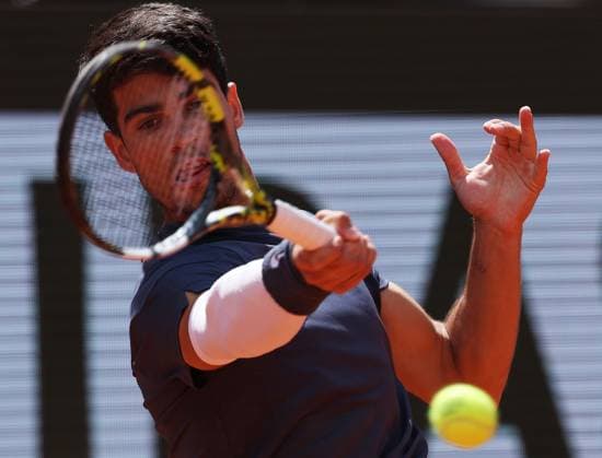 (240609) -- PARIS, June 9, 2024 -- Carlos Alcaraz hits a return during the men s singles final between Carlos Alcaraz of Spain and Alexander Zverev of Germany at the French tennis tournament in Paris, France, June 9, 2024. ) (SP)FRANCE-PARIS-TENNIS-FRENCH OPEN-MEN S SINGLES FINAL GaoxJing 