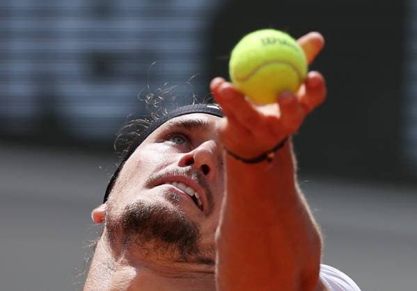 (240609) -- PARIS, June 9, 2024 -- Alexander Zverev serves during the men s singles final between Carlos Alcaraz of Spain and Alexander Zverev of Germany at the French tennis tournament in Paris, France, June 9, 2024. ) (SP)FRANCE-PARIS-TENNIS-FRENCH OPEN-MEN S SINGLES FINAL GaoxJing 