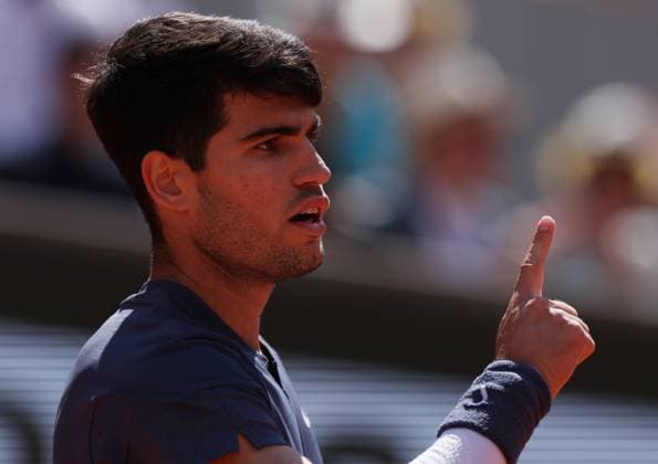 (240609) -- PARIS, June 9, 2024 -- Carlos Alcaraz gestures during the men s singles final between Carlos Alcaraz of Spain and Alexander Zverev of Germany at the French tennis tournament in Paris, France, June 9, 2024. ) (SP)FRANCE-PARIS-TENNIS-FRENCH OPEN-MEN S SINGLES FINAL GaoxJing 
