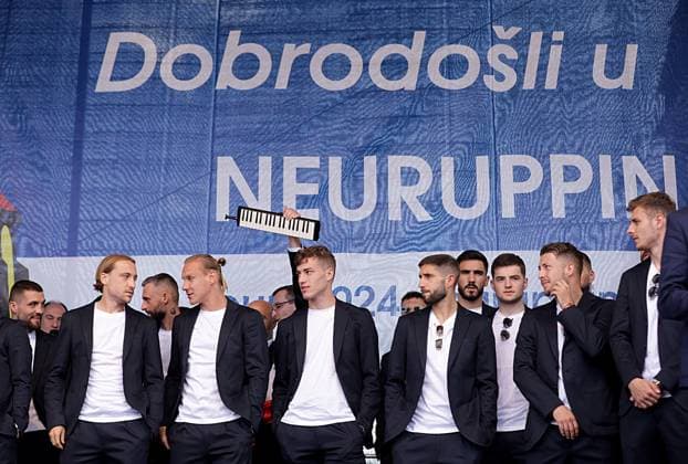 Sport Bilder des Tages Croatia Squad UEFA EURO, EM, Europameisterschaft,Fussball 2024 Neuruppin Welcome party Croatia Squad arrive at Croatia national team, Nationalteam UEFA EURO 2024 Welcome party at Neuruppin s school square in Neuruppin, Germany on June 9, 2024. The Croatian Football Federation has chosen the Neuruppin base camp for the Croatia national team during EURO 2024. LukaxStanzl PIXSELL