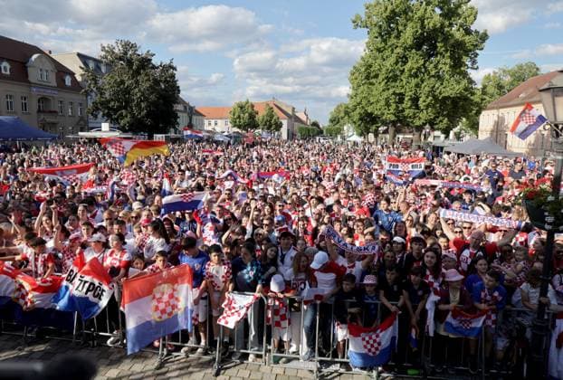 Croatia Squad UEFA EURO, EM, Europameisterschaft,Fussball 2024 Neuruppin Welcome party Croatia fans cheer during Croatia national team, Nationalteam UEFA EURO 2024 Welcome party at Neuruppin s school square in Neuruppin, Germany on June 9, 2024. The Croatian Football Federation has chosen the Neuruppin base camp for the Croatia national team during EURO 2024. LukaxStanzl PIXSELL