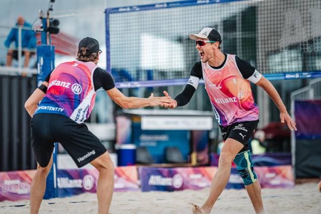 Beach volleyball men German Beach Tour 2024 Tourstop Bremen 09 06 2024 f l Paul Henning and Bennet Poniewaz cheer and clap Bremen Waterfront Bremen Germany