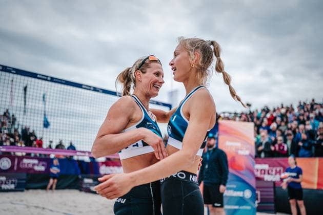 Beach volleyball women German Beach Tour 2024 Tourstop Bremen 09 06 2024 f l Kim van de Velde and Paula Schürholz hug each other after the victory Bremen Waterfront Bremen Germany