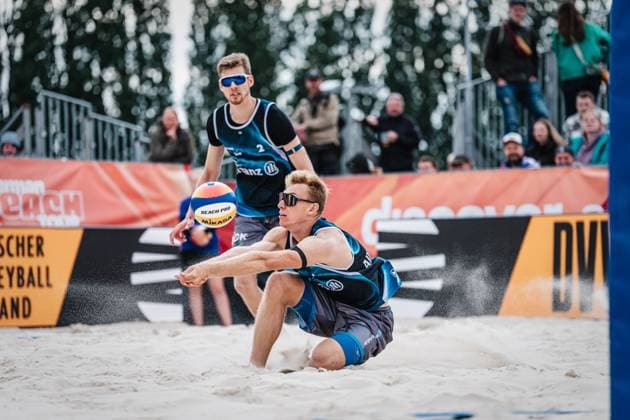 Beach volleyball men German Beach Tour 2024 Tourstop Bremen 09 06 2024 Jonas Reinhardt takes the ball Bremen Waterfront Bremen Germany