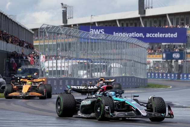 June 9, 2024, Montreal, Pq, CANADA: Mercedes driver George Russell, right, leads as fellow Brit, McLaren driver Lando Norris, left, passes into second place during the Canadian Grand Prix Formula 1 car race, in Montreal, Sunday, June 9, 2024. Canada News - June 9, 2024  - ZUMAc35_ 20240609_zaf_c35_045 Copyright: xChristinnexMuschix
