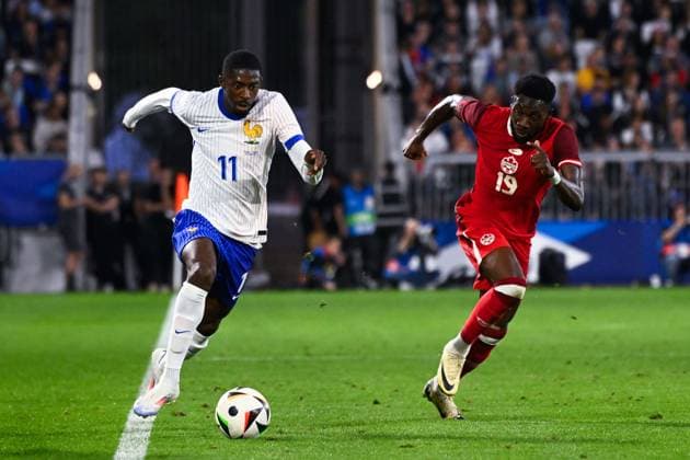 Ousmane Dembele ( 11 - France ) and Alphonso DAVIES ( 19 - Canada ) during the Friendly match between France and Canada at Matmut Atlantique on June 09, 2024 in Bordeaux, France. ( Photo by federico pestellini panoramic ) - FOOTBALL : France vs Canada - Bordeaux - 09 06 2024 FedericoPestellini Panoramic 