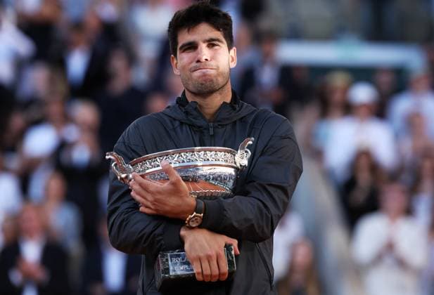 (240610) -- PARIS, June 10, 2024 -- Carlos Alcaraz reacts during the awarding ceremony after the men s singles final match between Carlos Alcaraz of Spain and Alexander Zverev of Germany at the French Open tennis tournament at Roland Garros, Paris, France, June 9, 2024. ) (SP)FRANCE-PARIS-TENNIS-FRENCH OPEN-MEN S SINGLES-FINAL GaoxJing 