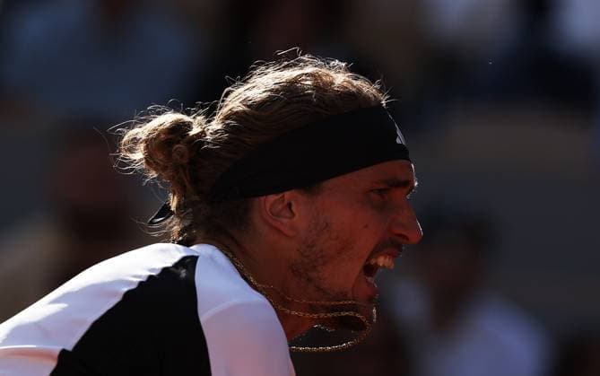 (240610) -- PARIS, June 10, 2024 -- Alexander Zverev reacts during the men s singles final match between Carlos Alcaraz of Spain and Alexander Zverev of Germany at the French Open tennis tournament at Roland Garros, Paris, France, June 9, 2024. ) (SP)FRANCE-PARIS-TENNIS-FRENCH OPEN-MEN S SINGLES-FINAL GaoxJing 