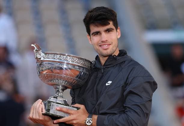 (240610) -- PARIS, June 10, 2024 -- Carlos Alcaraz poses with the trophy during the awarding ceremony after the men s singles final match between Carlos Alcaraz of Spain and Alexander Zverev of Germany at the French Open tennis tournament at Roland Garros, Paris, France, June 9, 2024. ) (SP)FRANCE-PARIS-TENNIS-FRENCH OPEN-MEN S SINGLES-FINAL GaoxJing 