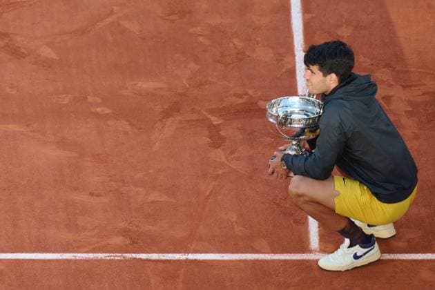 (240610) -- PARIS, June 10, 2024 -- Carlos Alcaraz reacts during the awarding ceremony after the men s singles final match between Carlos Alcaraz of Spain and Alexander Zverev of Germany at the French Open tennis tournament at Roland Garros, Paris, France, June 9, 2024. ) (SP)FRANCE-PARIS-TENNIS-FRENCH OPEN-MEN S SINGLES-FINAL MengxDingbo 