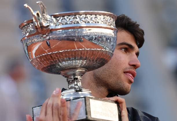 (240610) -- PARIS, June 10, 2024 -- Carlos Alcaraz holds the trophy during the awarding ceremony after the men s singles final match between Carlos Alcaraz of Spain and Alexander Zverev of Germany at the French Open tennis tournament at Roland Garros, Paris, France, June 9, 2024. ) (SP)FRANCE-PARIS-TENNIS-FRENCH OPEN-MEN S SINGLES-FINAL GaoxJing 