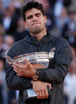 (240610) -- PARIS, June 10, 2024 -- Carlos Alcaraz reacts during the awarding ceremony after the men s singles final match between Carlos Alcaraz of Spain and Alexander Zverev of Germany at the French Open tennis tournament at Roland Garros, Paris, France, June 9, 2024. ) (SP)FRANCE-PARIS-TENNIS-FRENCH OPEN-MEN S SINGLES-FINAL GaoxJing 